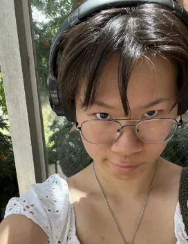 young woman with glasses