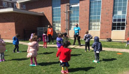 Children dancing outside