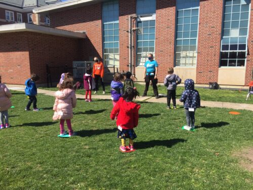 Children dance outside