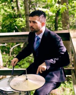 Drew playing the drums