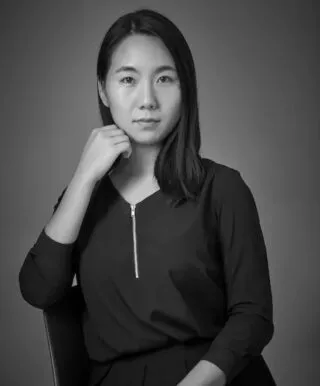 black and white headshot of Ming Kim