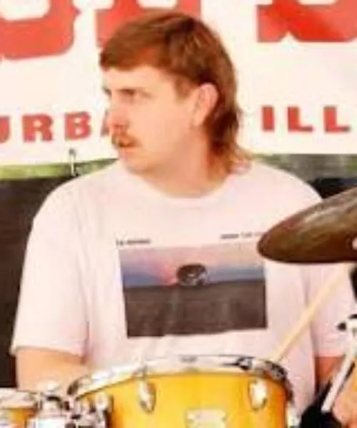 photo of Jamie playing the drums