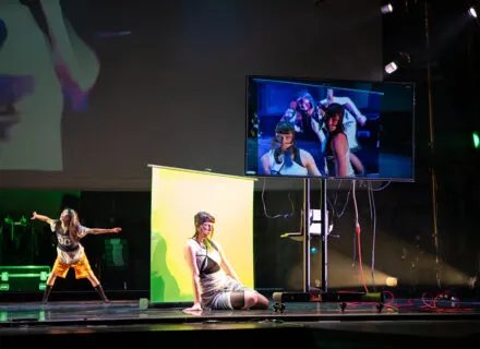 dancers jumping through the air