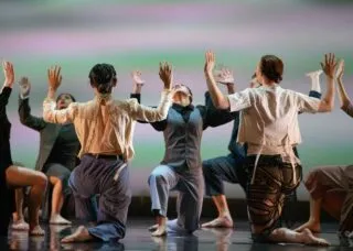 one student jumps in front of a group