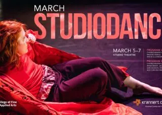 dancer lies on floor with red coat