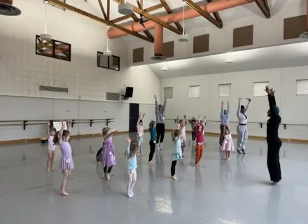 Children dance inside the studio