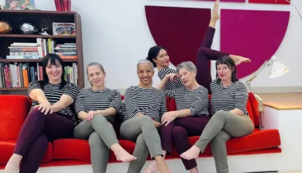 rendering of six people sitting on a couch