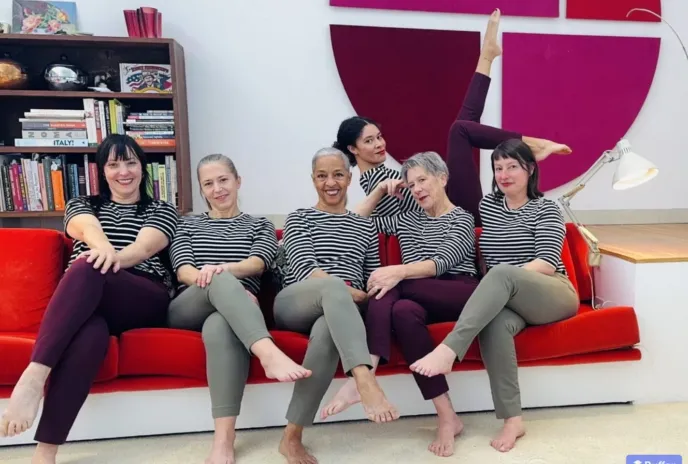 rendering of six people sitting on a couch