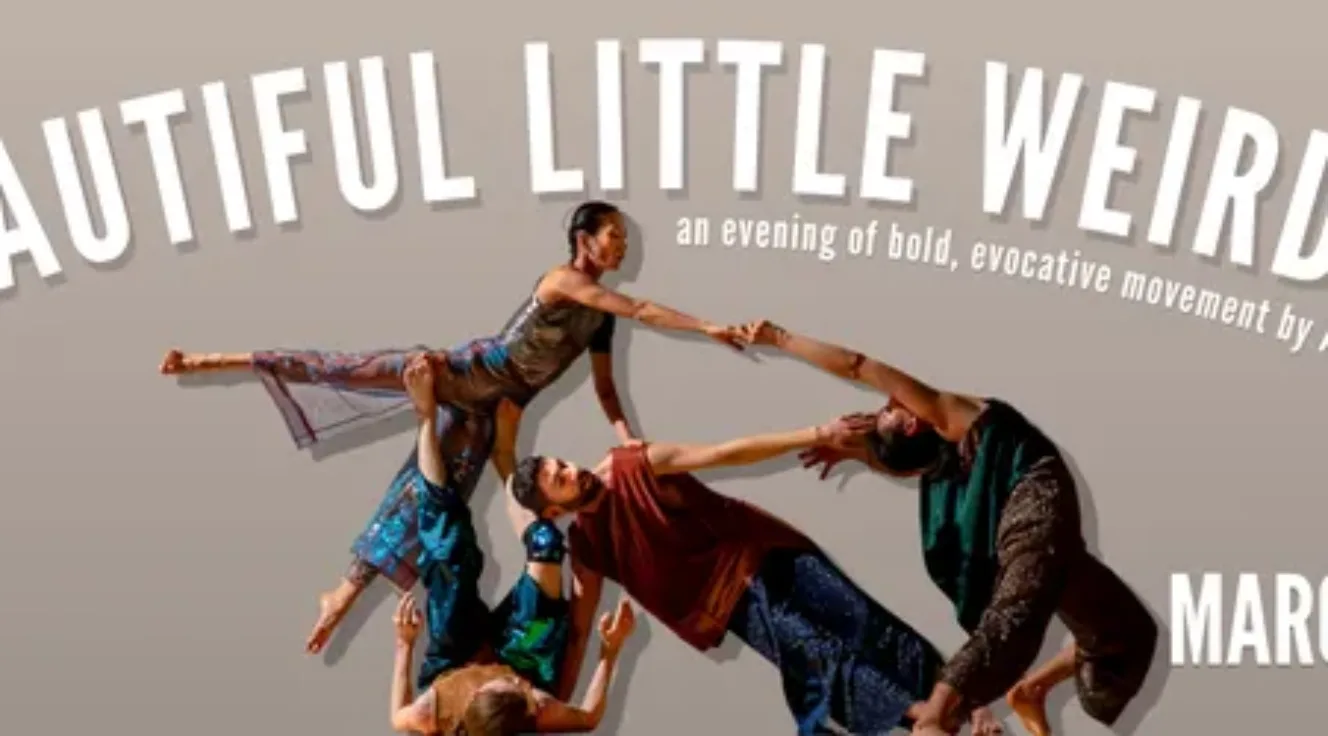 dancers in colorful costumes holding each other