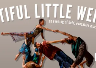 dancers in colorful costumes holding each other