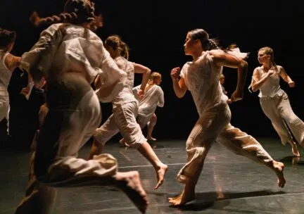 A dancer jumps through the air