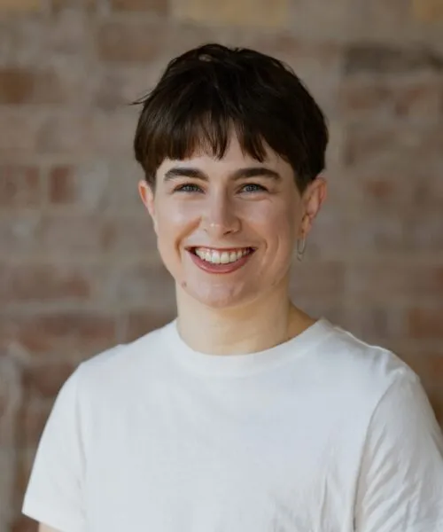 headshot of Gillian, wearing white shirt
