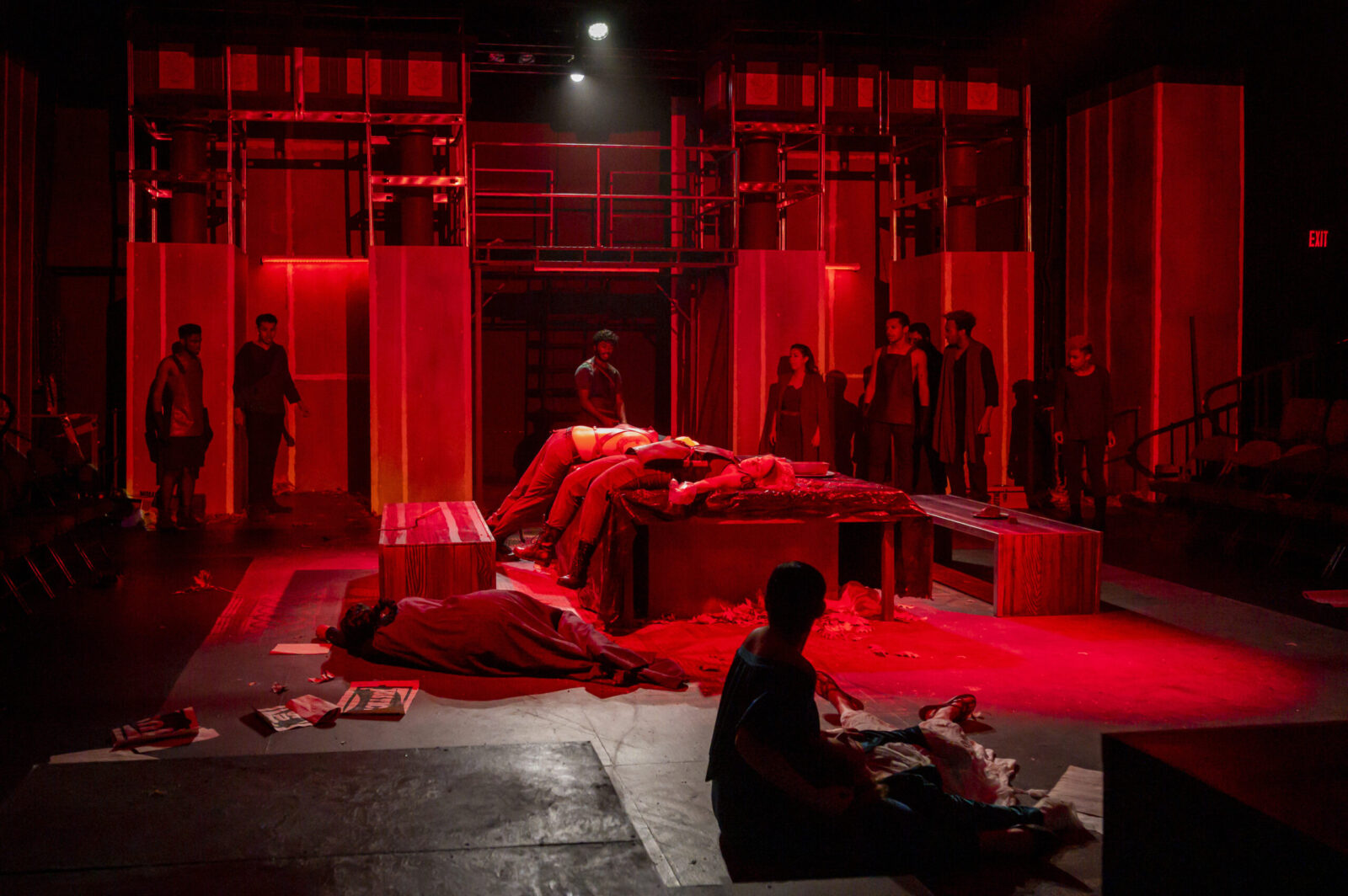 Stage lit in red as character dies
