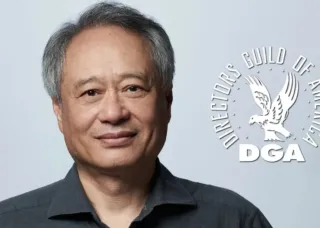 ang lee smiles with dga graphic on gray background