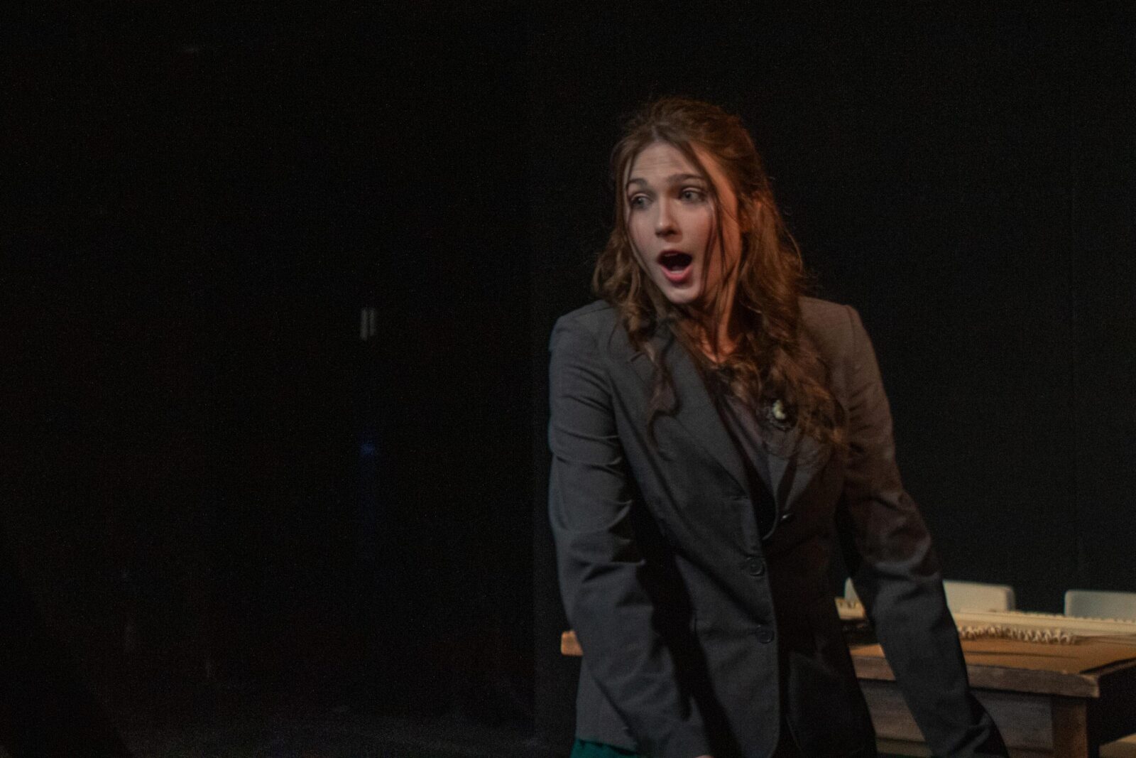 person speaking onstage