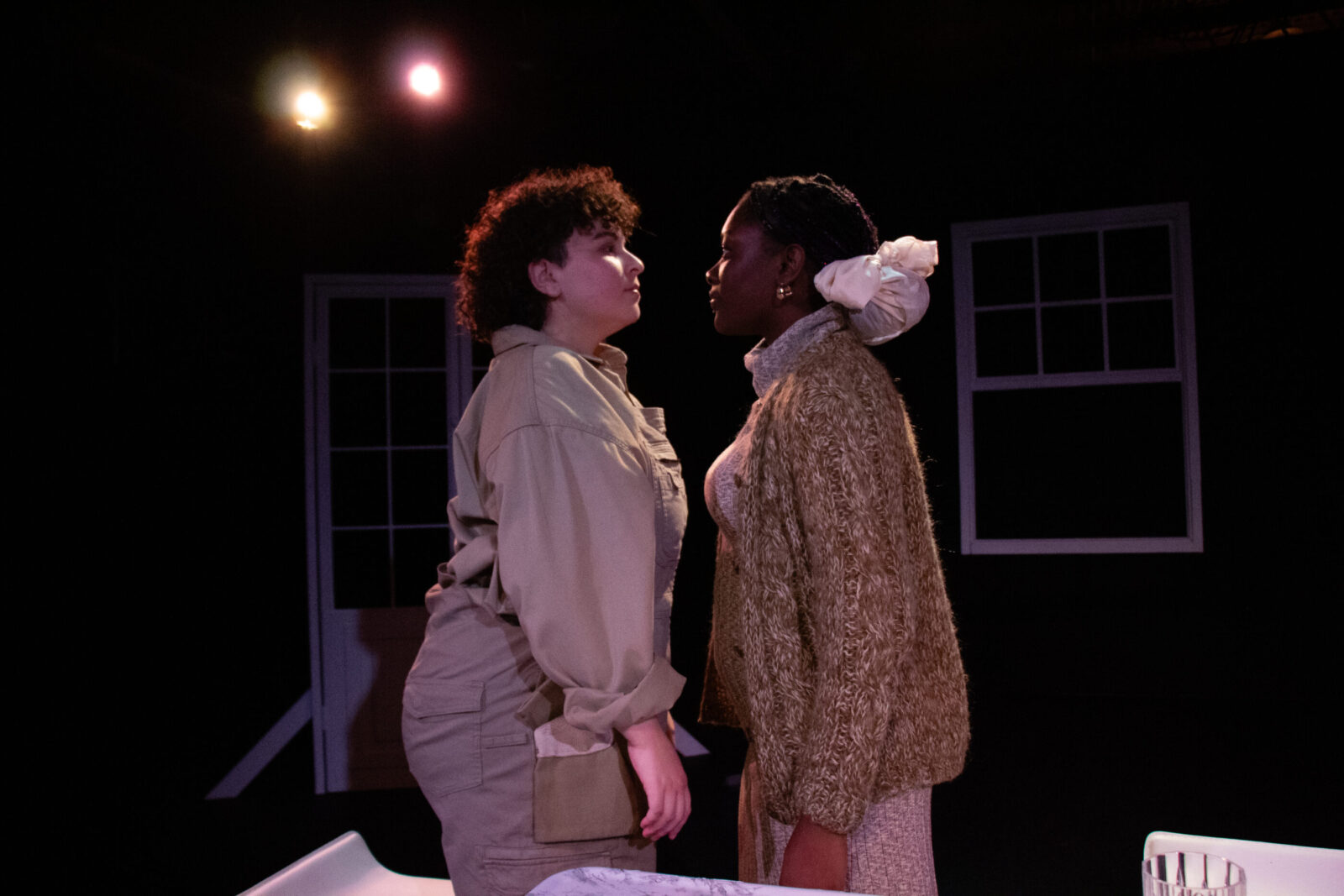 two people onstage face to face