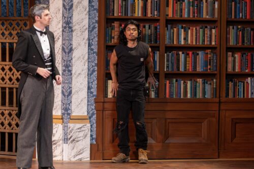 two people onstage in costume