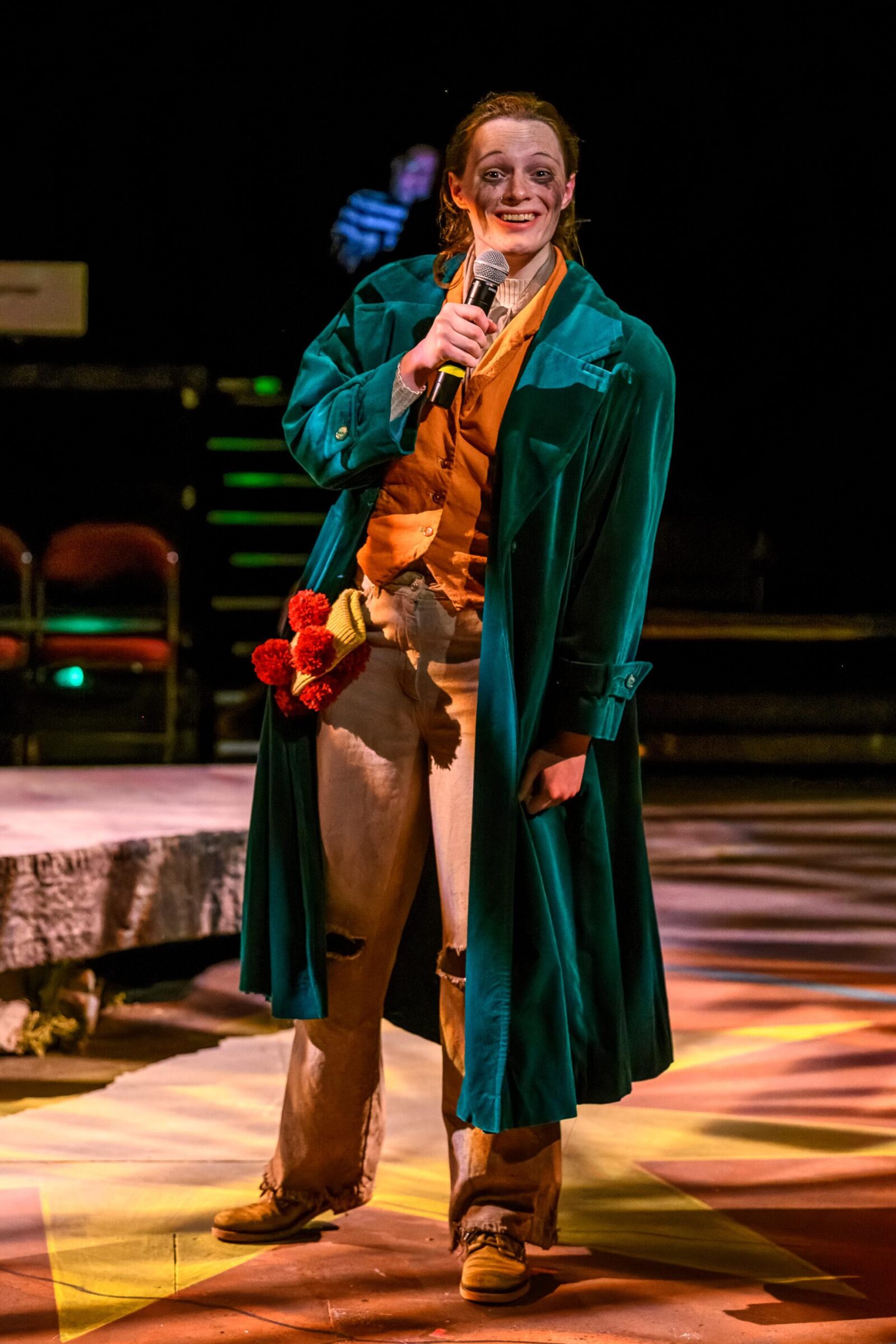 two people onstage face to face