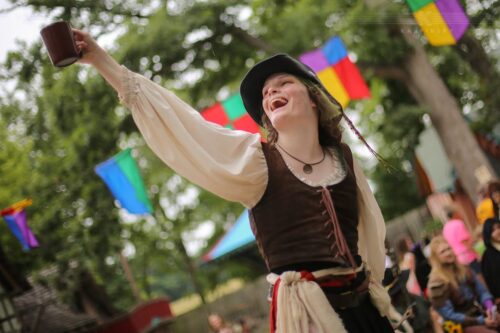 two people onstage in costume