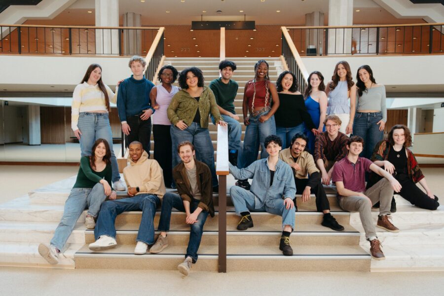 many people gathered on a staircase