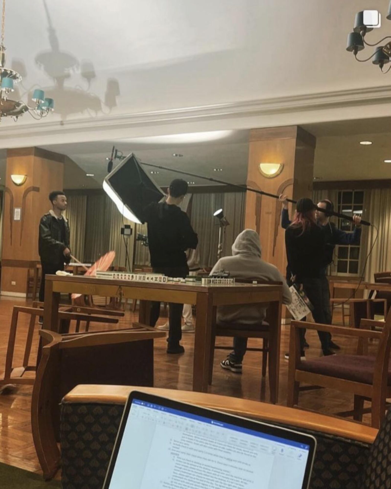 a person onstage singing into a mic