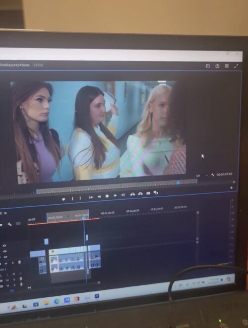 a person lies on a bench with a look of surprise