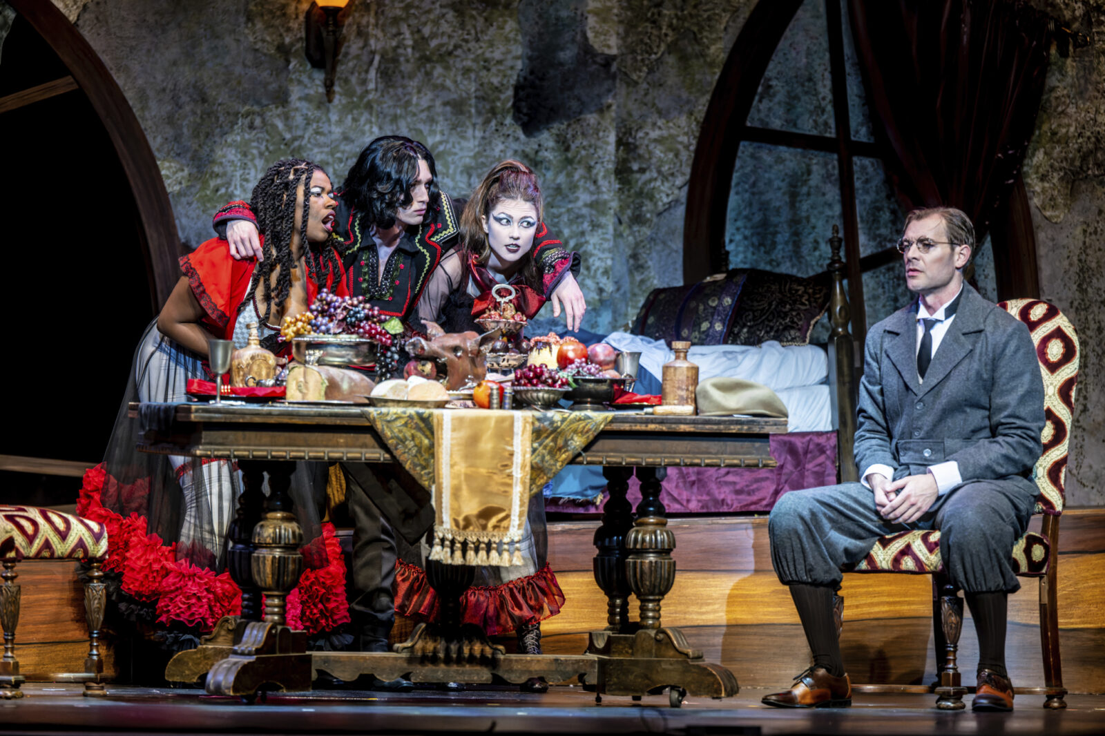 several people gathered around a dinner table