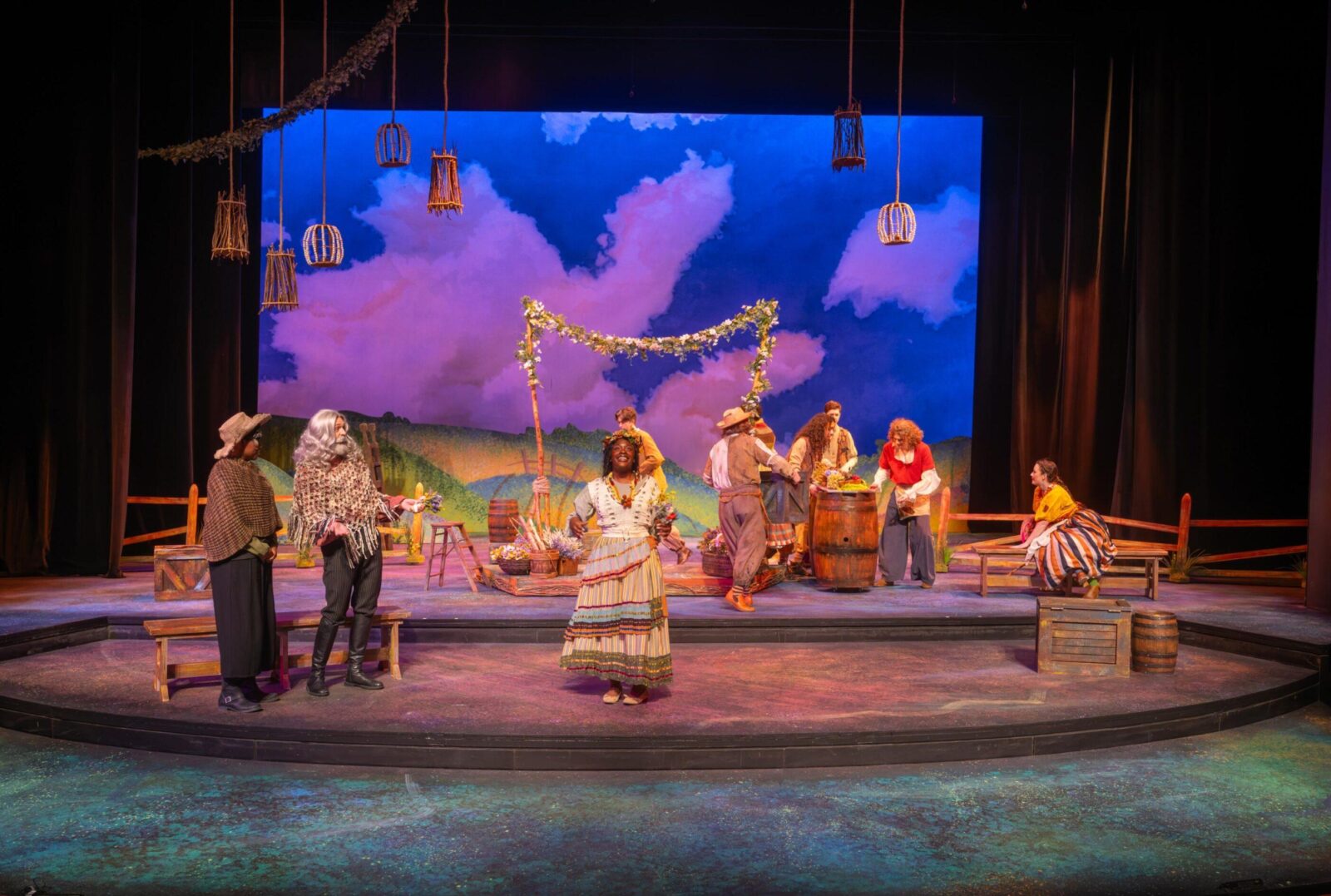 many people onstage in costume