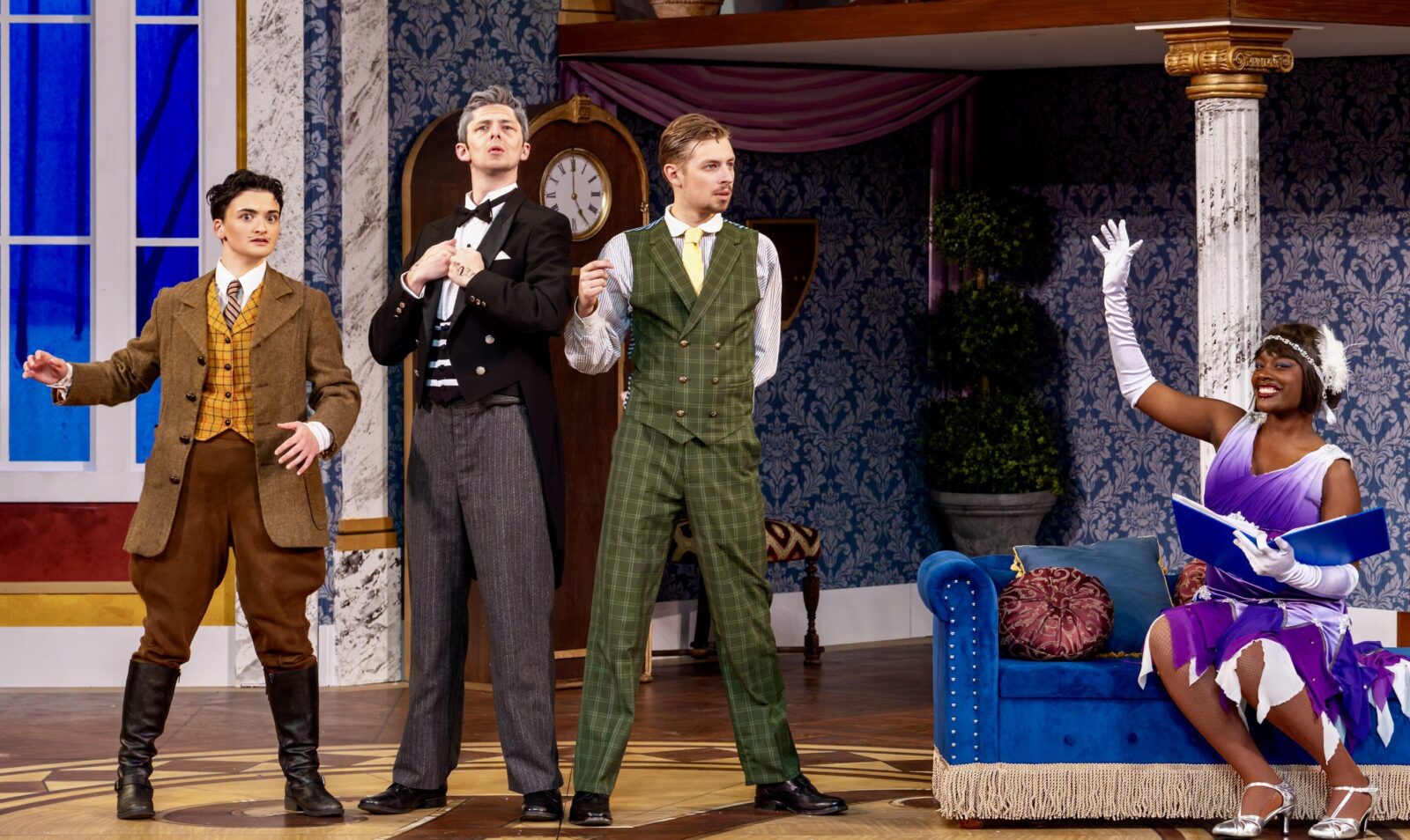 The inspectors looks for clues at Haversham Manor during a production of The Play That Goes Wrong