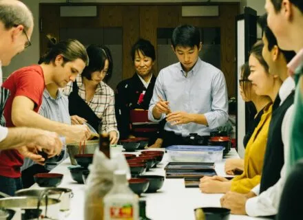 Jennifer Gunji-Ballsrud, director of Japan House, oversees work of students.