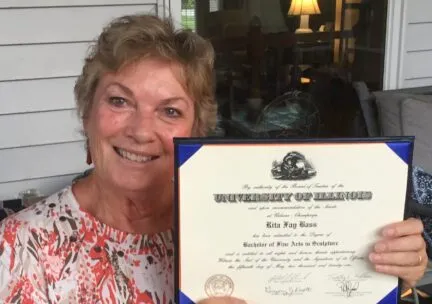 Rita Bass with diploma