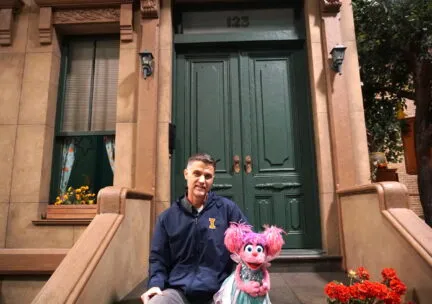 Paul Rudolph with Abby Cadabby on the set of Sesame Street