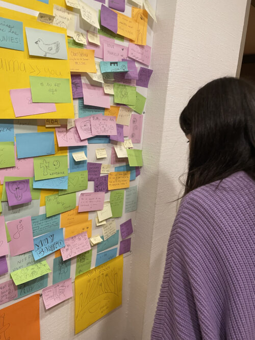 Girl looking at sticky notes