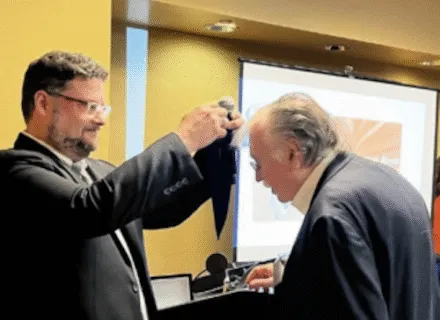 Ralph Johnson, FAIA, LEED AP (BArch '71) receives the Illinois Medal at AIA '22.