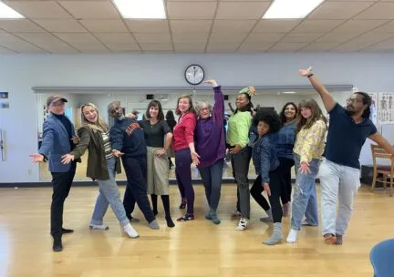 Faculty and students posing together