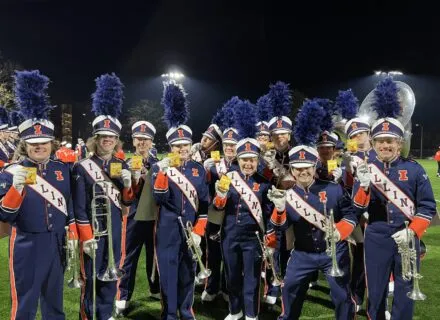 Marching Illini holding their ChopSavers