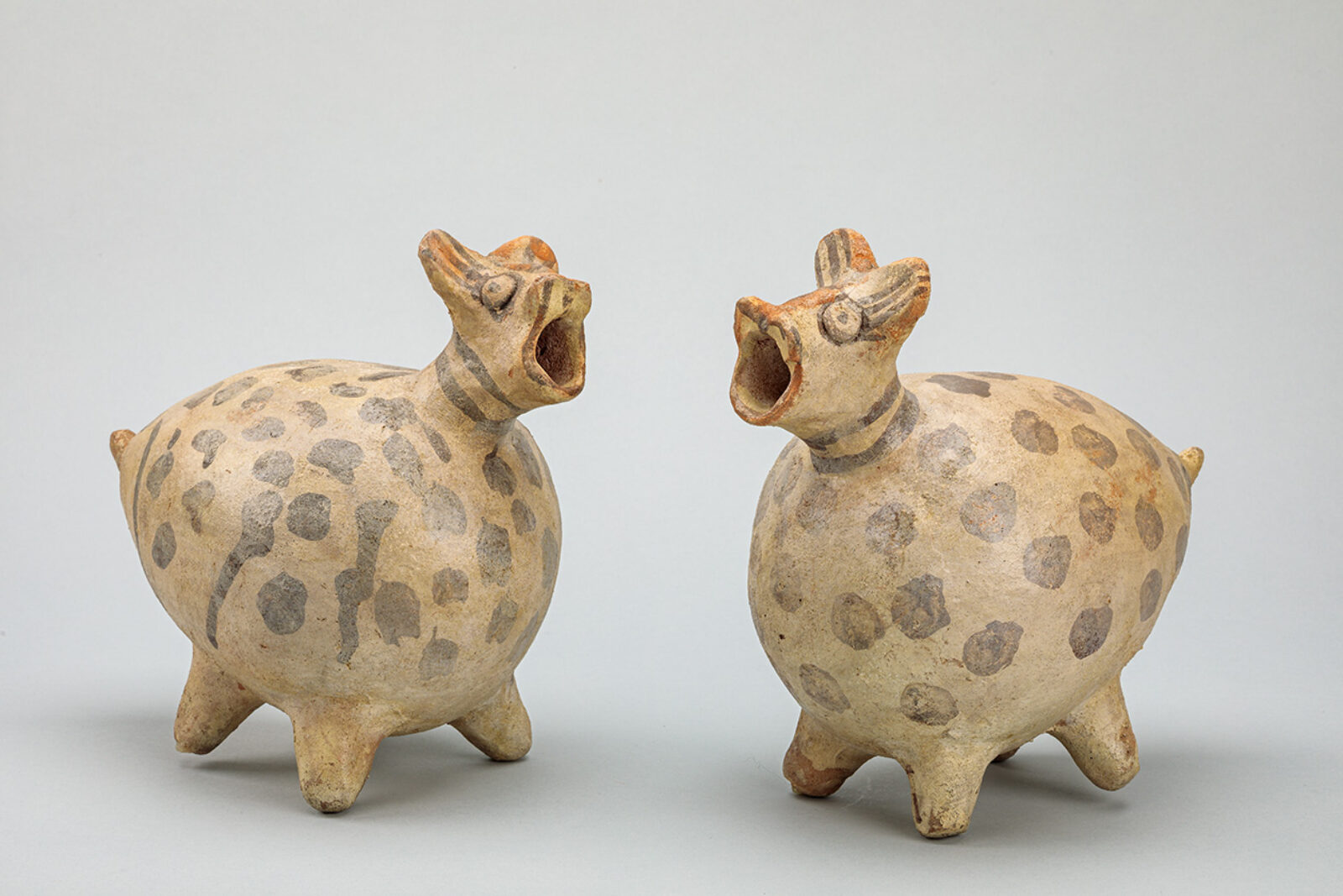 Pair of Sculptural Vessels in form of Llamas Chancay, central coast, Peru Ceramic 8 ¼ x 5 3/8 x 8 7/8 in. 8 ¼ x 5 ¼ x 9 ¼ in. 1967-29-330/331