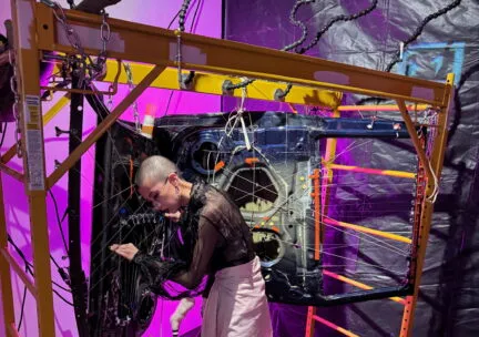 Noël Wan playing the Angel of Death harp