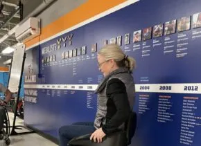 person sits in chair