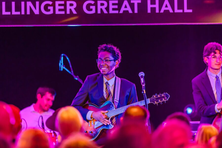 Person playing music on stage