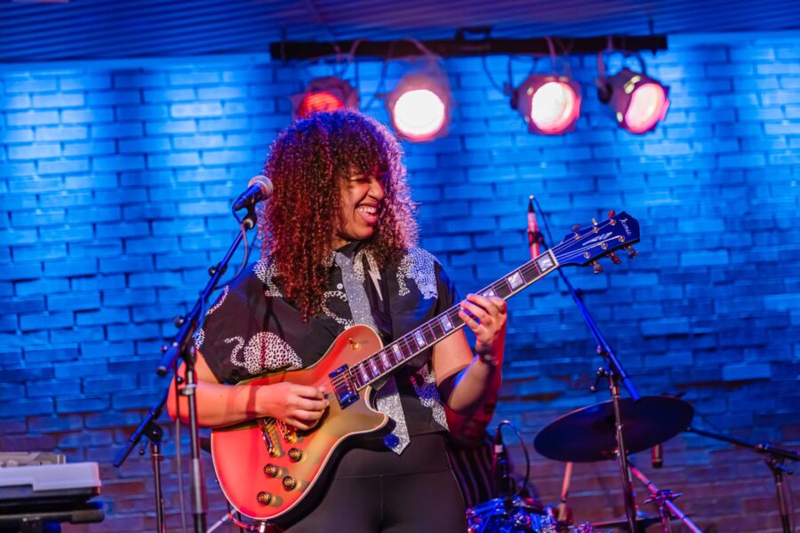 Person playing guitar