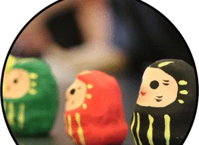 three paper maches dolls