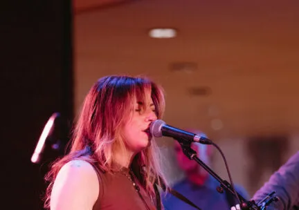 woman playing guitar